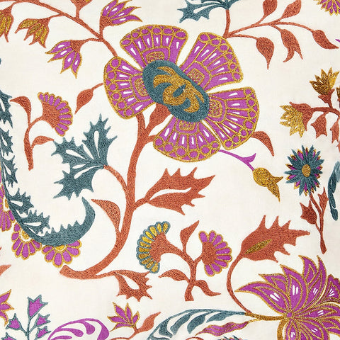 A square throw pillow with a floral and geometric pattern, featuring a combination of beige, brown, and colorful floral designs on a light background, finished with embroidery details and a striped back.