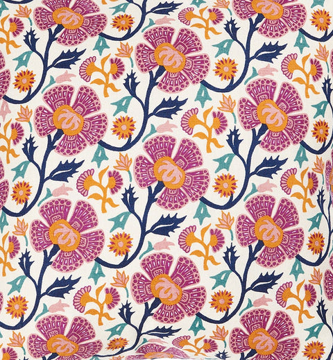 A square-shaped throw pillow with a floral pattern in pink, orange, and blue colors, featuring a traditional geometric design.