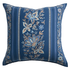 Decorative pillow with floral embroidery on a blue background