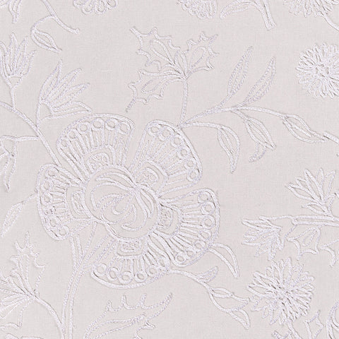 Tonal white paisley throw pillow with white embroidery.